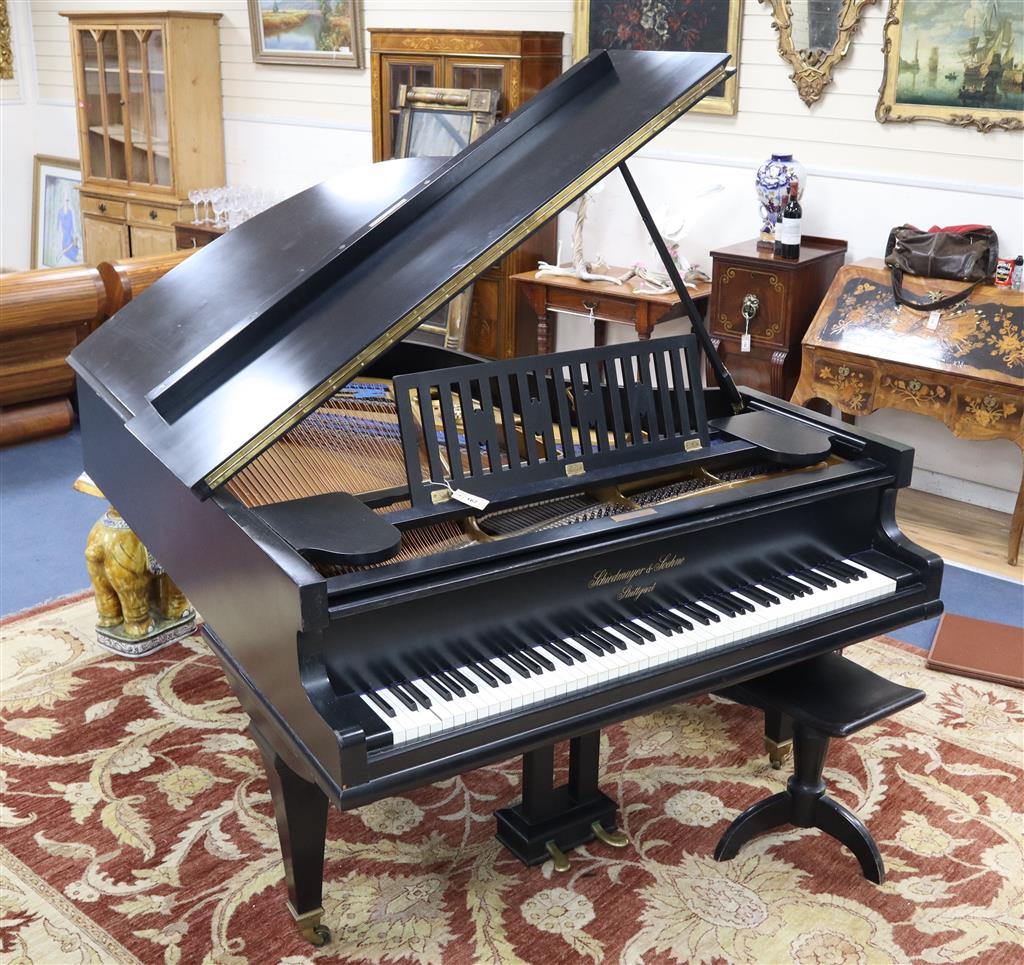 An early 20th century ebonised cased boudoir grand, by Schiedmayer & Son, Stuttgart, model 15, serial number 39536 on square legs, toge